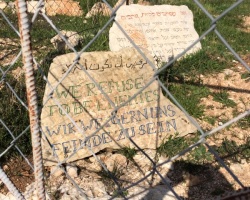 'We refuse to be enemies.' Stone on a Palestinian Christian farm. Photograph by Chris Chamberlain. | Sacraparental.com